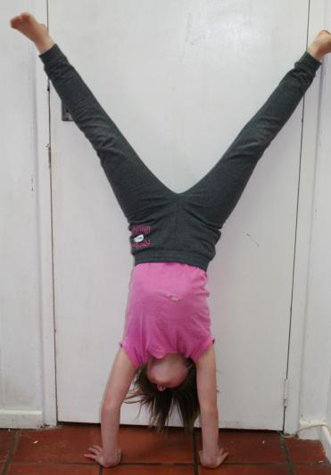 R-hand-stand-against-wall_1.jpg